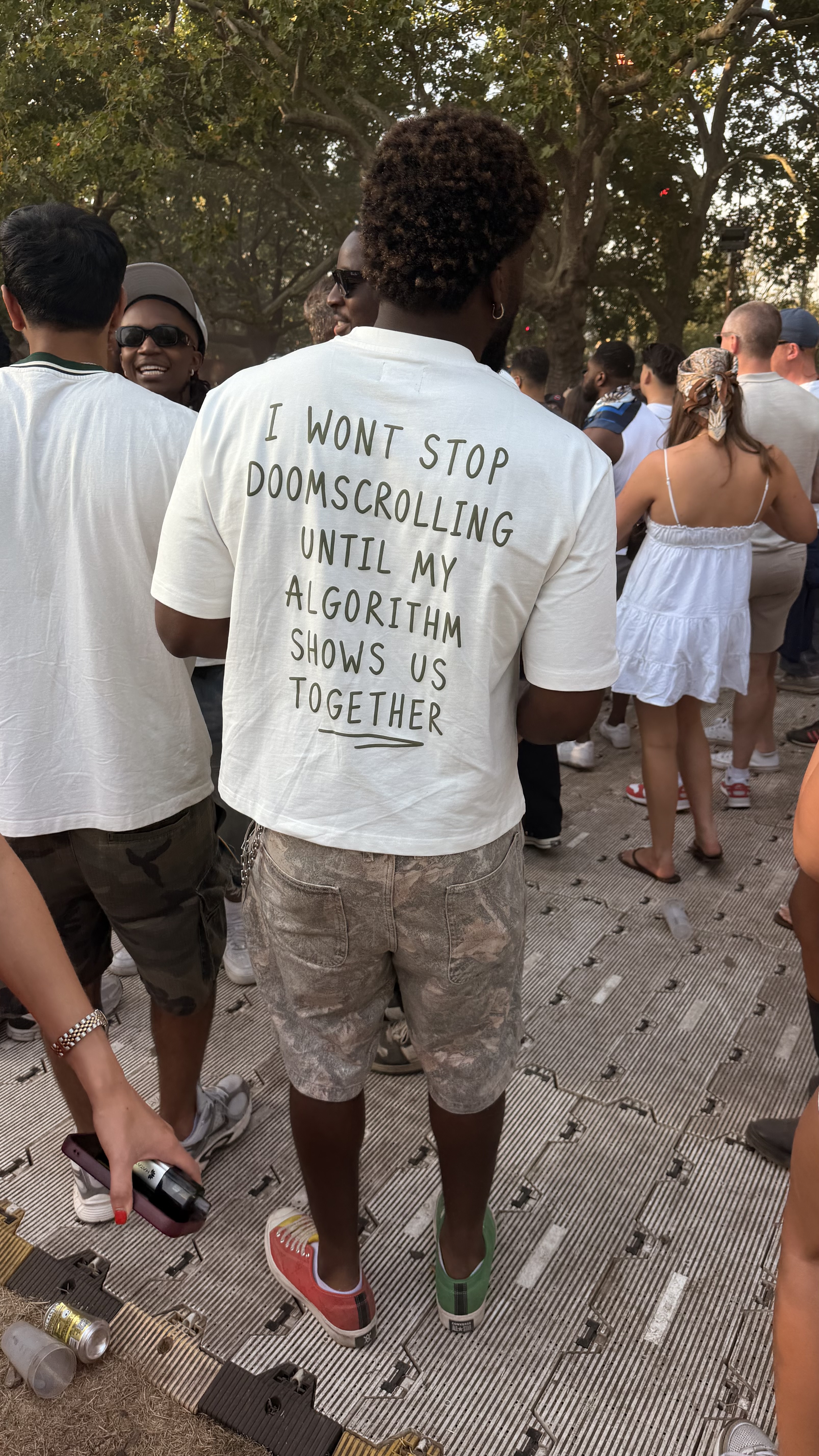 Doomscroll 'Away' Tee worn outdoors, back print