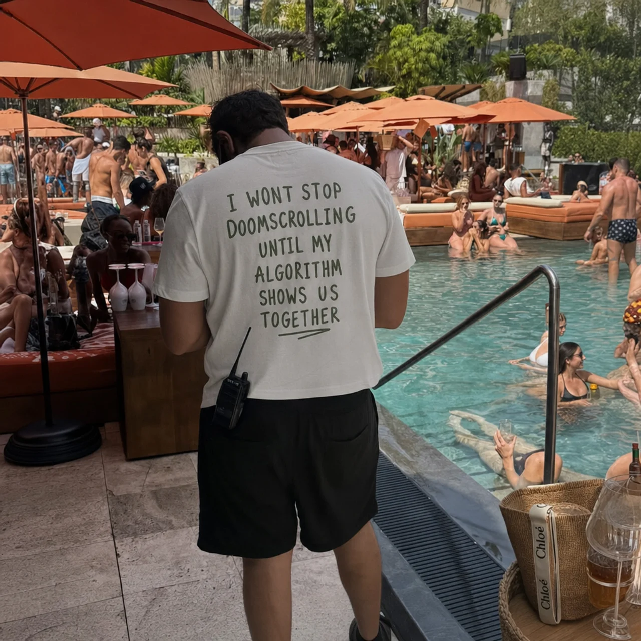 Doomscroll 'Away' Tee worn poolside